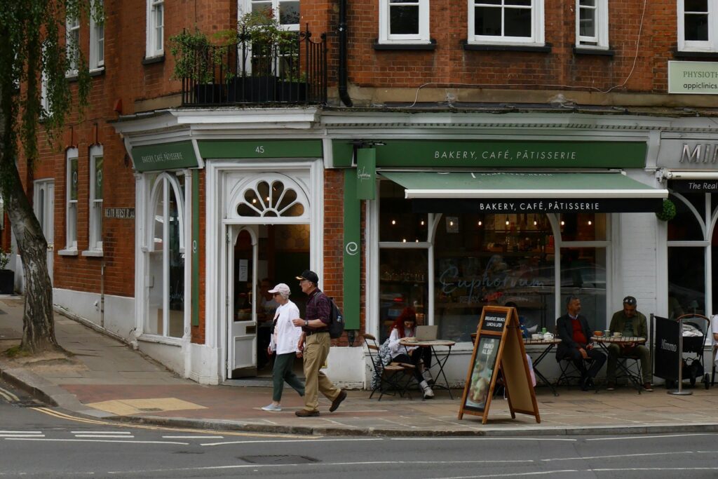 Bakery with people dining outside