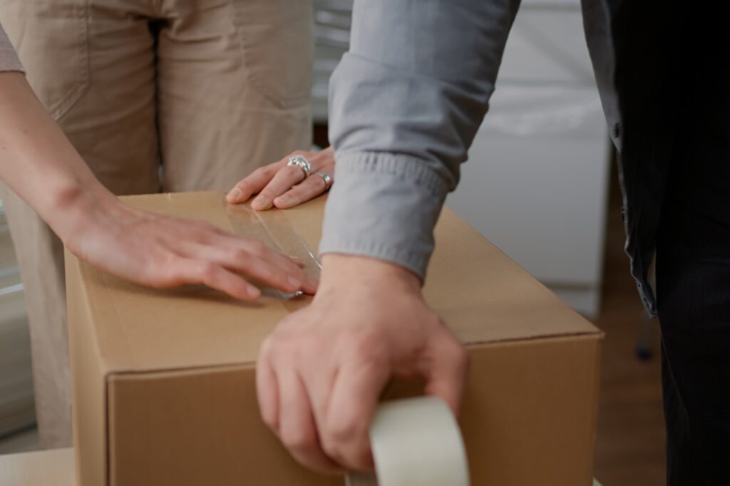 A couple is packing up for their house move