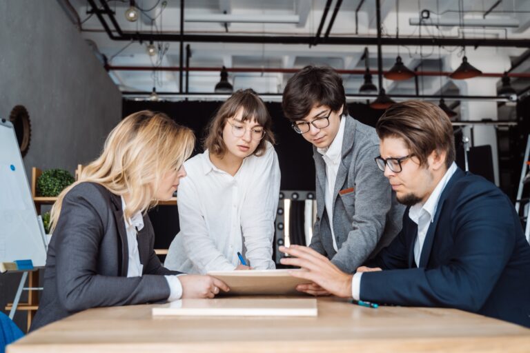 The moving committee having a meeting about the office move in the concept of 'How to Plan and Coordinate an Office Move to Coulsdon'.